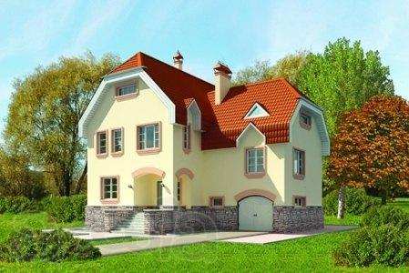 Двухэтажный дом из газобетона на 250 кв. м с фигурной крышей.