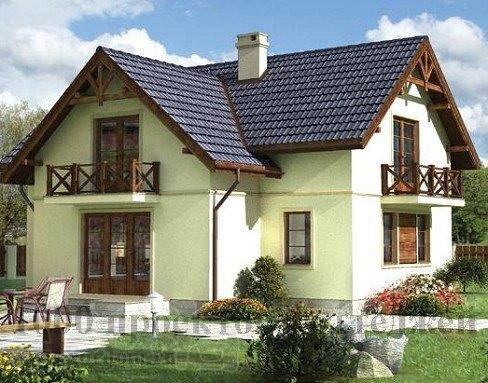 Двухэтажный кирпичный дом в стиле кантри оригинальной формы.